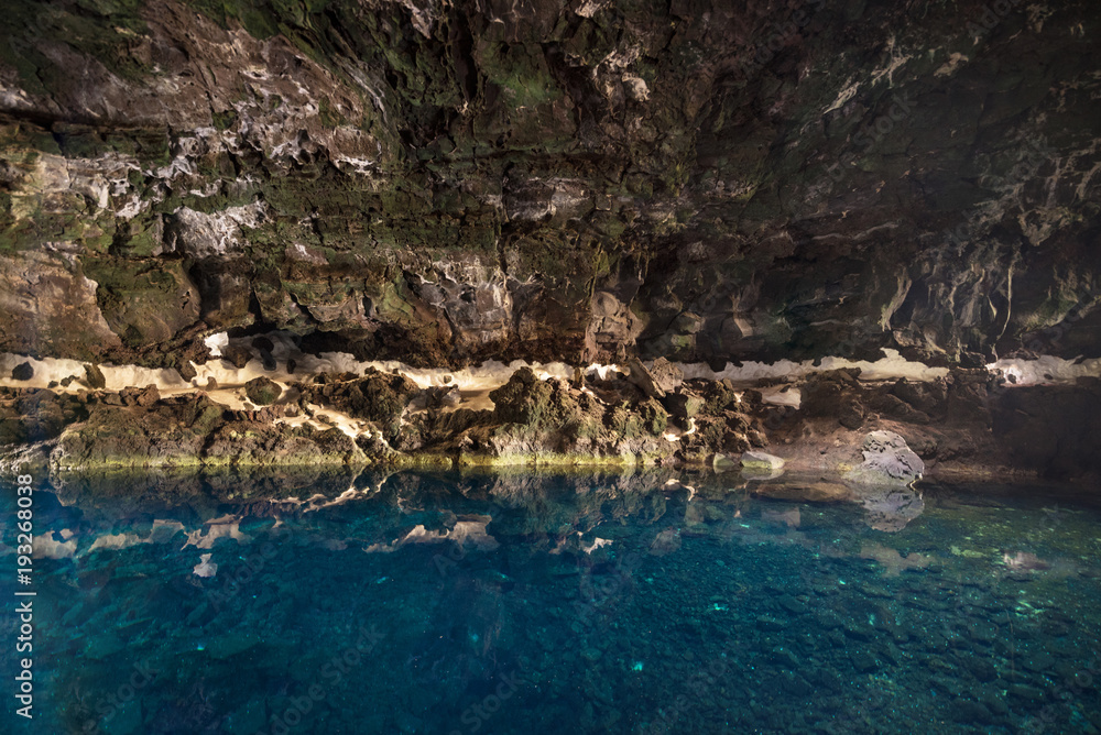 Famous landmark Los Jameos del Agua Cave and lagoon in Lanzarote, Canary islands, Spain. Famous landmark Los Jameos del Agua Cave and lagoon in Lanzarote, Canary islands, Spain.