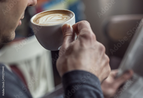 Drinking espresso