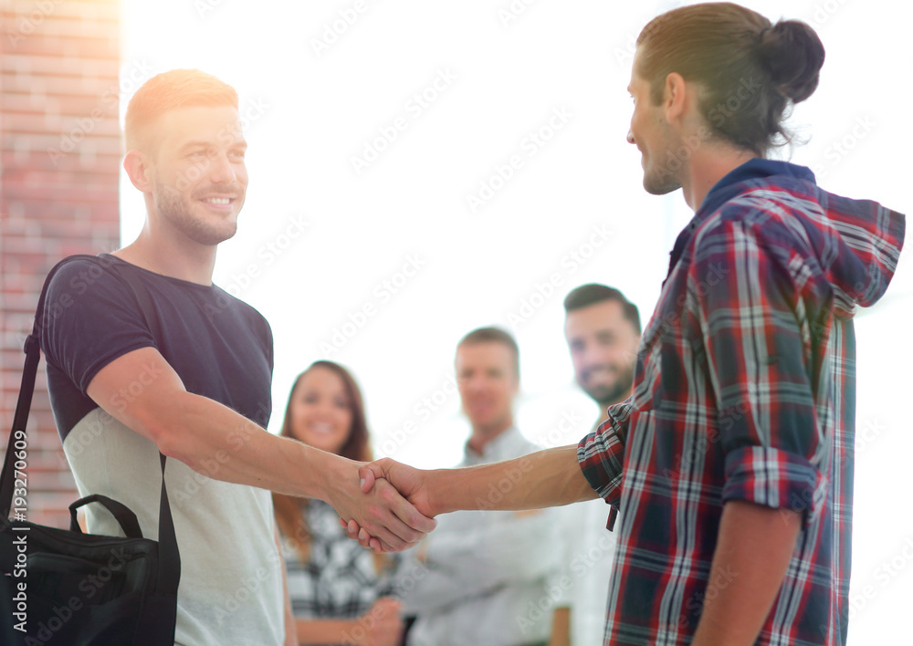 Obraz premium handshake staff of the Agency