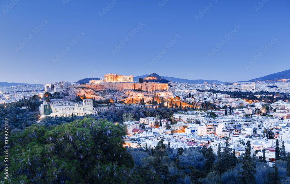 Aerial panoramic view of iconic landmark Parthenon in Athene, Greece. Amazing twilight scenery. Copyspace on the blue sky. Athens and Parthenon is famous and popular travel destination in Europe.