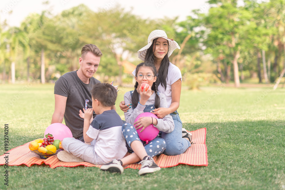 Young family with children having fun in nature Young family with children having fun in nature