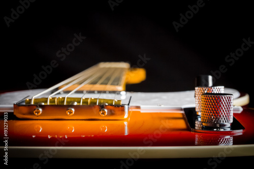 Close up of an Electric Guitar with a sunburst paint job