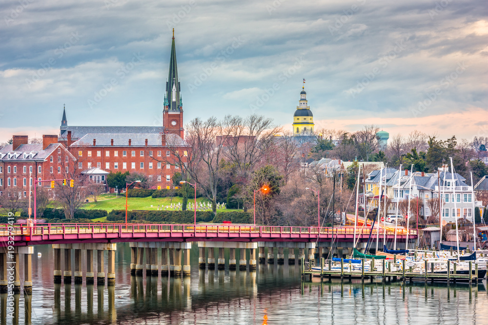 Annapolis, Maryland, USA State House and St. Mary's Church viewed over Annapolis Harbor and Eastport Bridge.