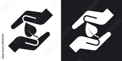 Vector hands protect the leaf icon. Two-tone version on black and white background photo