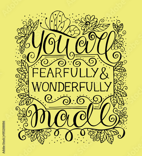 Hand lettering You are fearfully and wonderfully made near flowers and butterfly 
