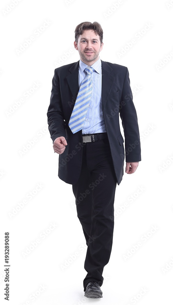 in full growth. businessman goes forward.isolated on a white