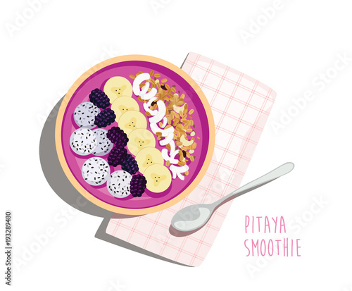 Pitaya smoothie Breakfast -  Dragon fruit smoothie bowl topped with pitaya, blackberries banana, coconut flakes and granola. Nutritive summer meal with napkin and spoon.