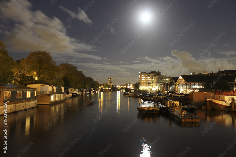 Moonlit canal in Amsterdam