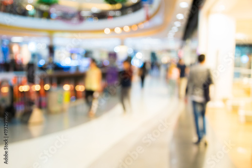 blurry image people man and woman waiking in shoppingmall.