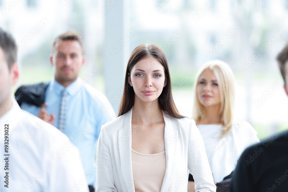Fototapeta premium confident business woman among his colleagues