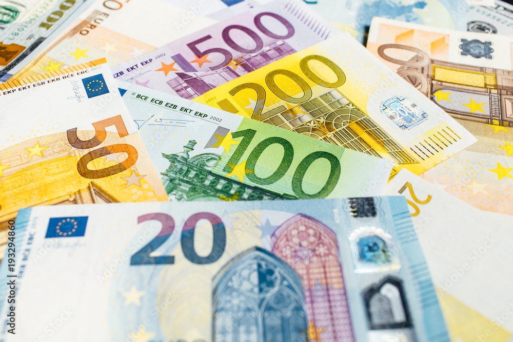 Close-Up of american US dollars and euros Close-Up of american US dollars and euros
