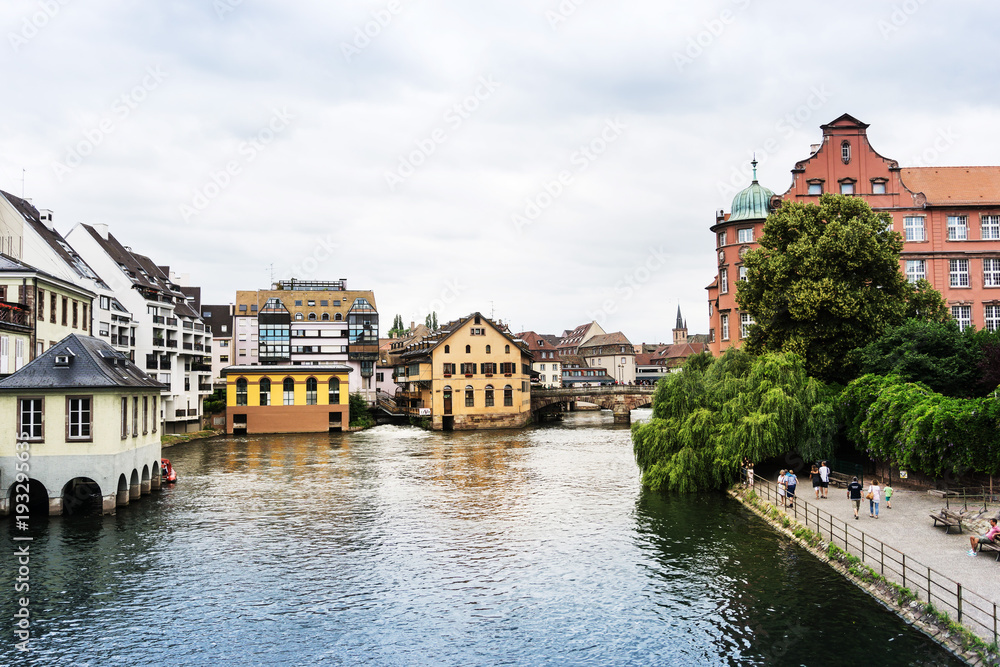 STRASBOURG, FRANCE - June 17, 2017 : Street view of Traditional houses in La Petite France, Strasbourg, Alsace, France STRASBOURG, FRANCE - June 17, 2017 : Street view of Traditional houses in La Petite France, Strasbourg, Alsace, France