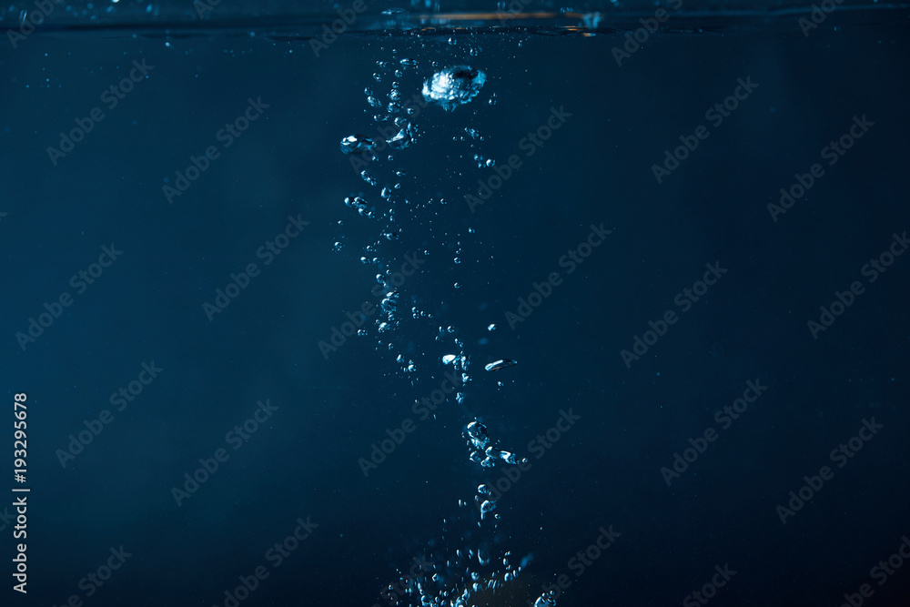 full frame of dark water with bubbles background - obrazy, fototapety, plakaty 