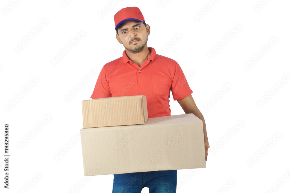 Angry delivery man holding carton box in uniform Angry delivery man holding carton box in uniform