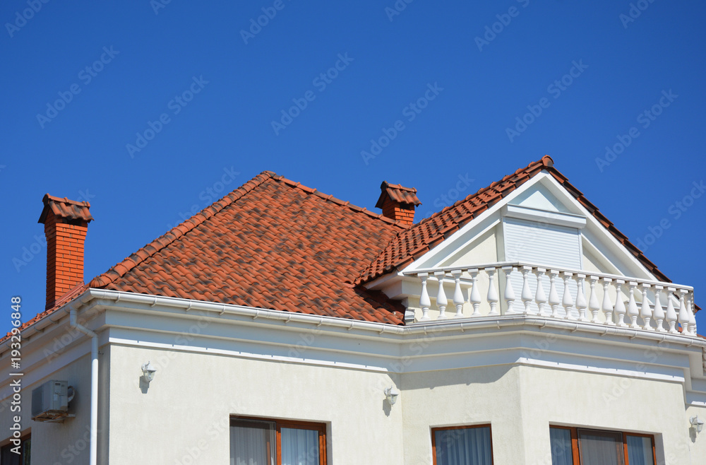 Luxury roofing constraction with natural clay roof tiles, house attic balcony and metal shutters, blinds. Luxury roofing constraction with natural clay roof tiles, house attic balcony and metal shutters, blinds.