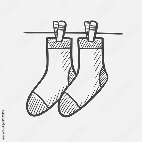 Vector hand drawn socks hanging on the clothesline outline doodle icon. Socks hanging on the clothesline sketch illustration for print, web, mobile and infographics isolated on white background.
