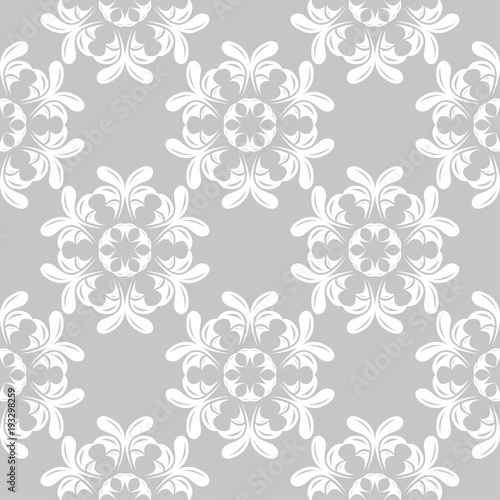 White flowers on gray background. Ornamental seamless pattern