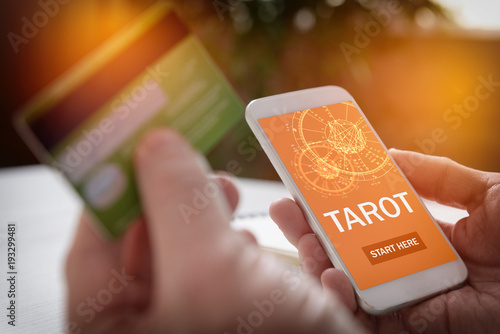 Tarot fortune telling application and credit card photo