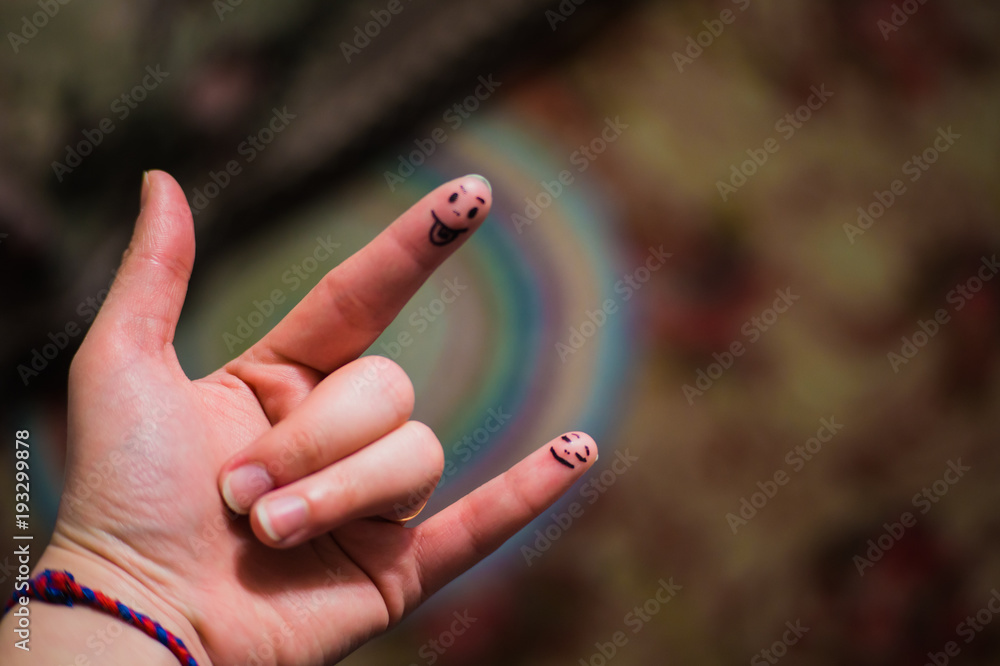 Fingers hardrock. The hand of man. Muzzles on the phalanges of the fingers. Fingers hardrock. The hand of man. Muzzles on the phalanges of the fingers.