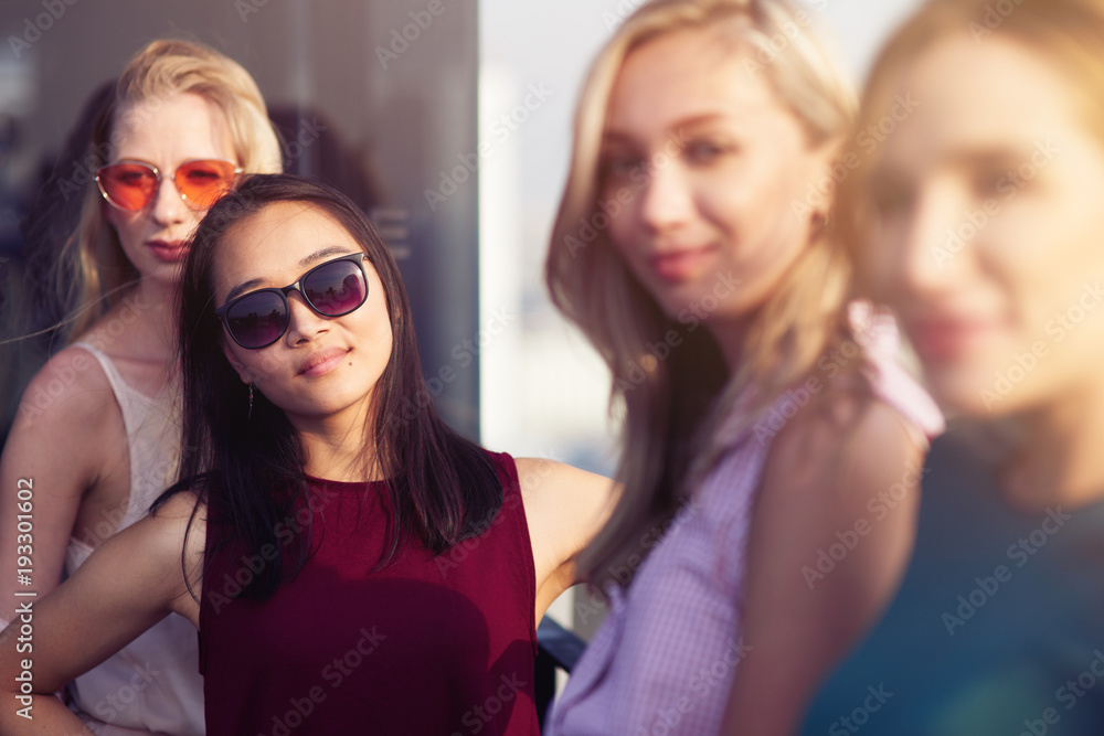 Nice young thai woman resting with her friends Nice young thai woman resting with her friends
