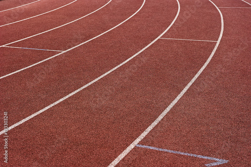 Red running track in stadium. Part of red running track 