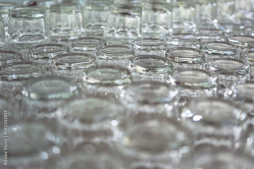 Close-up shot of a group of a glass of water was laid up preparing for use.