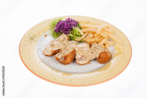 chicken breast stuffed with mushroom sauce and french fries
