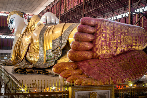 Beautiful reclining buddha image Chauk htat gyi reclining buddha (sweet eye buddha), yangon, myan photo