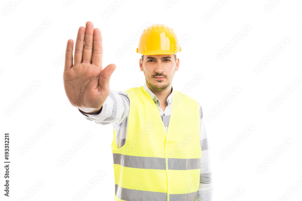 Engineer or architect showing palm as stop stay gesture sign. Engineer or architect showing palm as stop stay gesture sign.