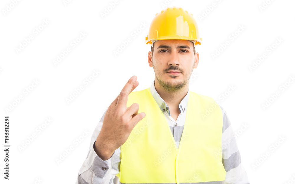 Builder or constructor making bad luck gesture.