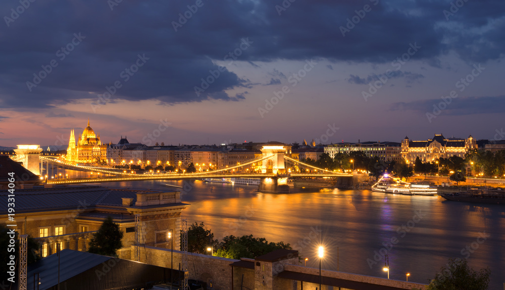 Budapest night panorama with Chain bridge and Parliament across Danube