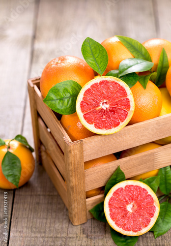 Fresh red grapefruit in the crate photo