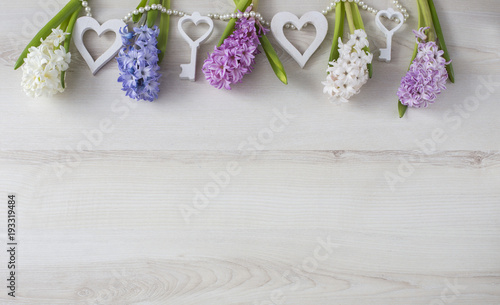 a festive background with hyacinths, hearts and pearls. March 8, mother's day, wedding, birthday.