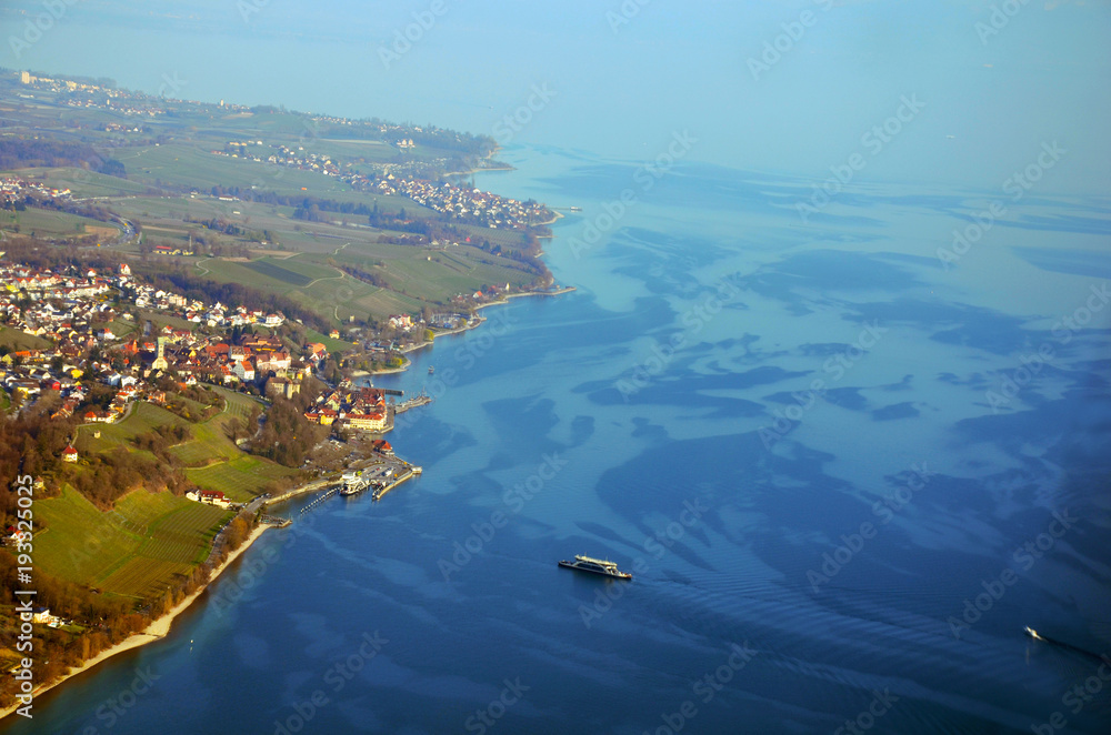 Aerial view of Meersburg, its ferry port and vineyards at Lake Constance, South  Germany in spring