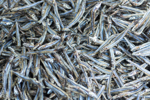 Dried Small fish used in Asian cuisine closeup photo