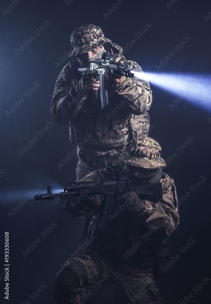 Elite squad soldiers with weapons and ammunition Elite squad soldiers with weapons and ammunition