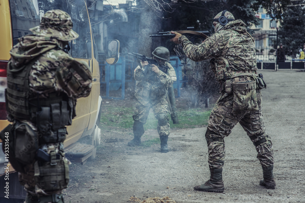 Fototapeta premium The storming of the bus with the terrorists