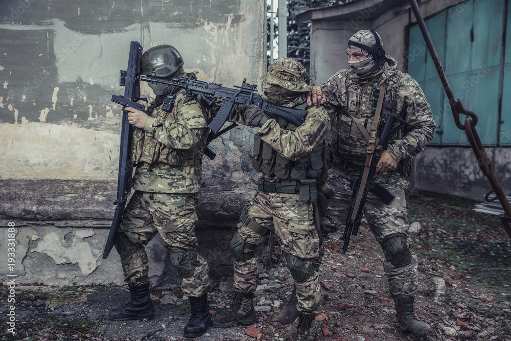 Elite squad soldiers with weapons and ammunition Elite squad soldiers with weapons and ammunition