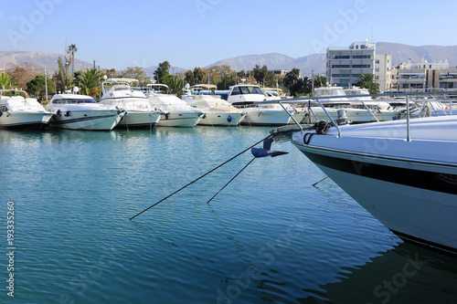 Summer time beautiful yachts moored in Glyfada port, Athens, Greece. photo