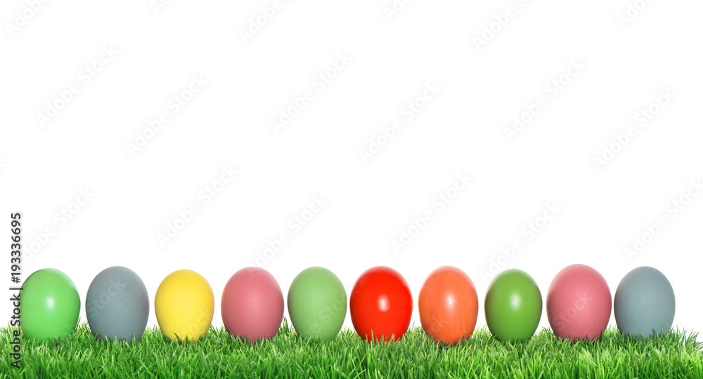 Easter eggs in green grass Spring holidays banner Easter eggs in green grass Spring holidays banner