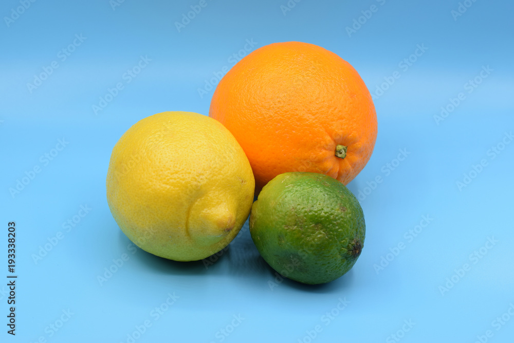 Citrus fruits on seamless blue background Citrus fruits on seamless blue background