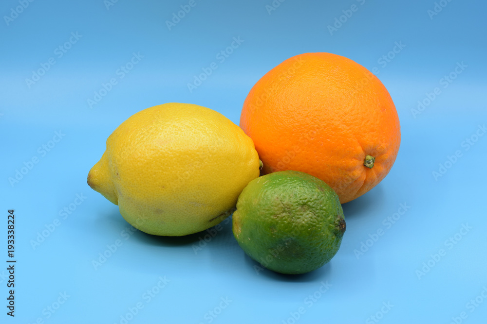 Citrus fruits on seamless blue background Citrus fruits on seamless blue background
