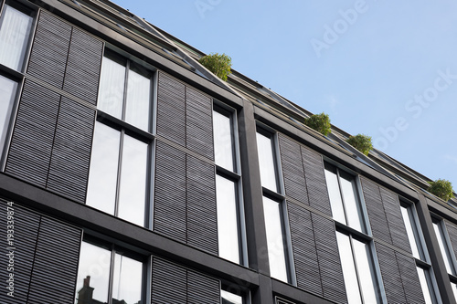 Wallpaper Mural Modern Building with Plants and Clear Blue Sky Backdrop Torontodigital.ca