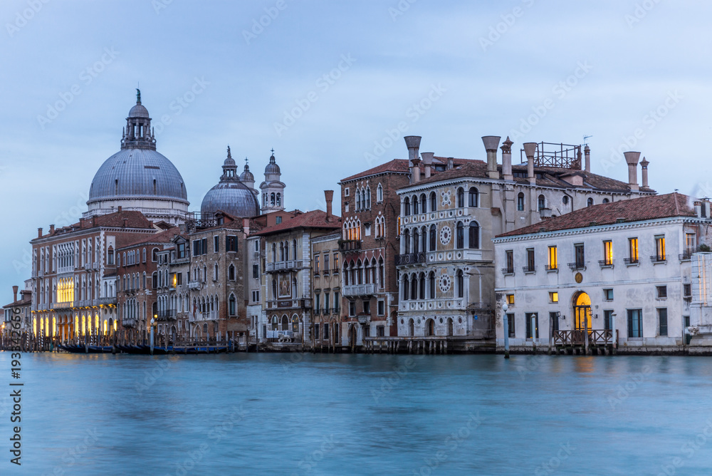 Naklejka premium View of the channels and old palaces in Venice at sunset - 1
