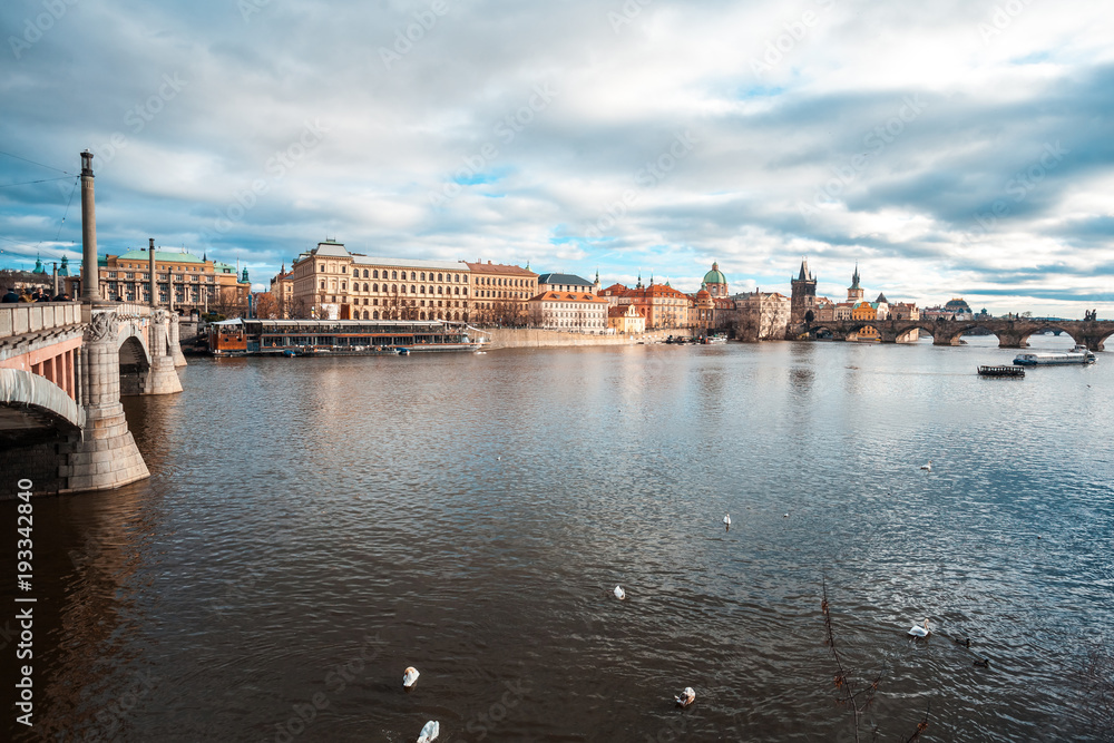 Fototapeta premium Vltava river and Charles bridge in Prague, Czech Republic