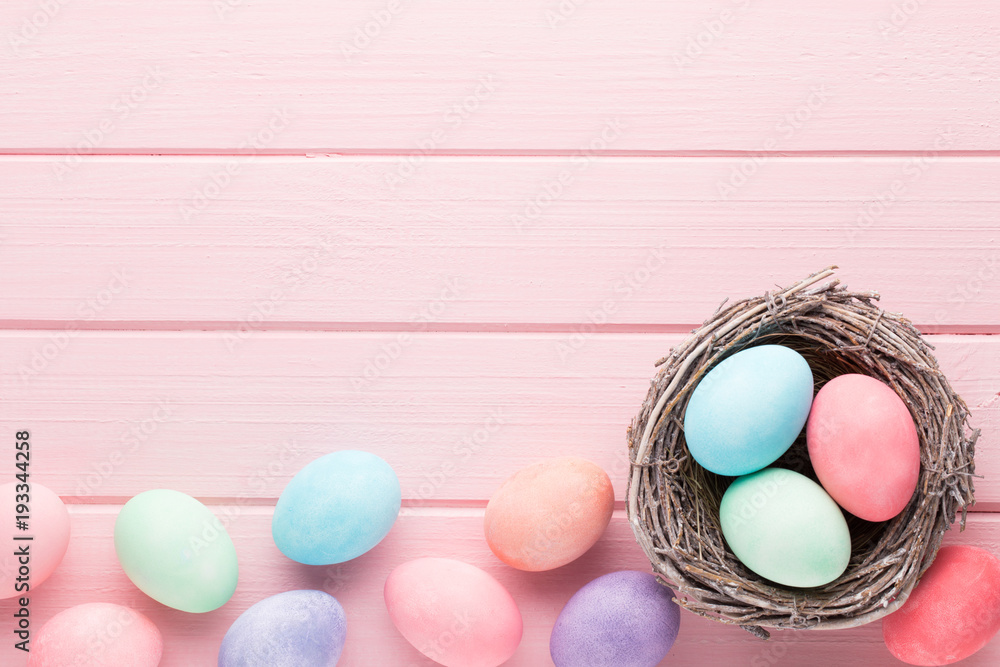 Obraz premium Pastel Easter eggs background. Spring greating card.