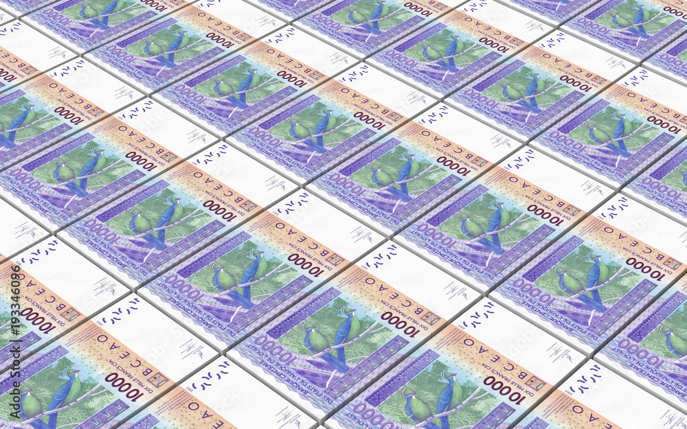 West African CFA francs bills stacked background. 3D illustration. West African CFA francs bills stacked background. 3D illustration.