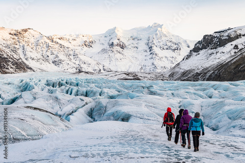 mountaineers hiking a glacier