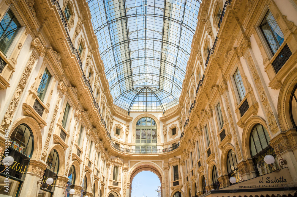 Fototapeta premium Vittorio Emanuele gallery in Square Piazza Duomo at morning, Milan, Italy.