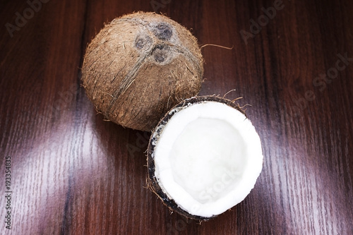 Coconut on a wooden background.